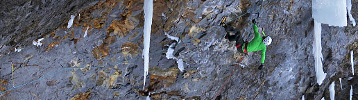 <strong>Overhead Hazard</strong></br>
                        Ever since my first trip to Helmcken Falls, I always wondered how the photos would turn out when taken from above.  I found out when photographing Tim and Klemen on Will Gadd’s new route, Overhead Hazard.  At times, depending on the wind, the climbers were totally obscured by the constant spray of water from the falls, making usable photos a matter of luck.